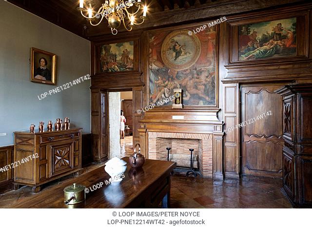 The small salon with typical 17 century furniture inside the Chateau de Monbazillac in France