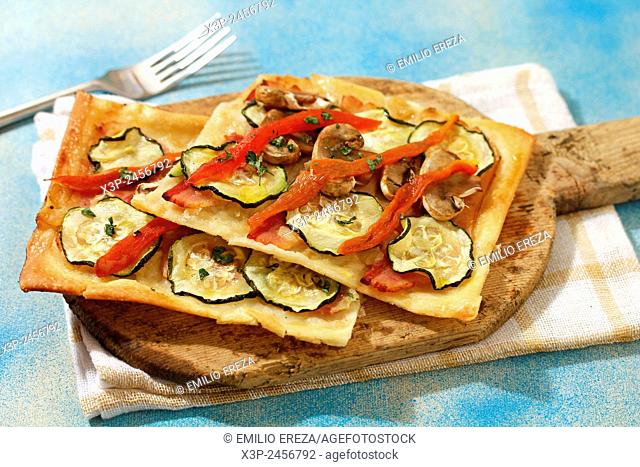 Savoury pastry with bacon and vegetables