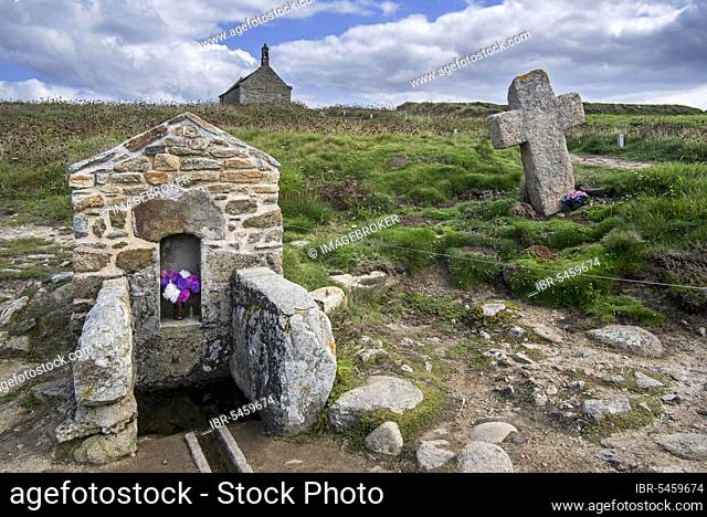 Saint well and stone cross at Saint Samson Chapel, Landunvez, Finistere, Brittany, France, Europe