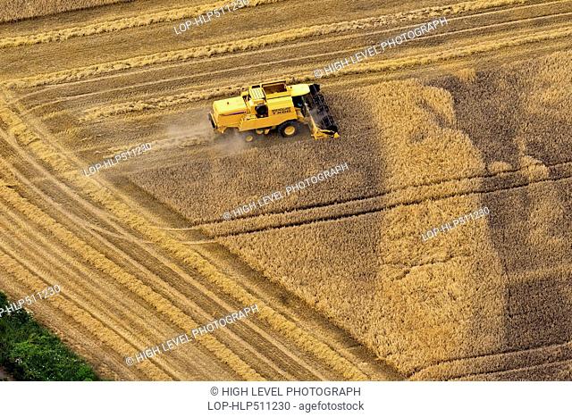 Aerial view of a combine harvester at work