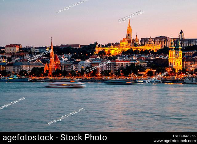 Night of Buda district Fisherman's Bastion and St. Matthias Church with Danube river in Budapest, Hungary