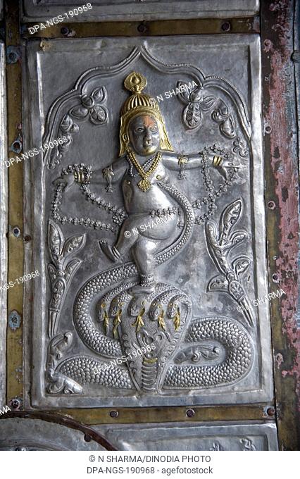 carving kaliya naag mardan on door bhimakali temple sarahan himachal pradesh India Asia