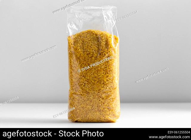 close up of bag with bulgur on white table