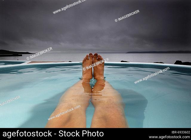 Hot Pot, Geothermal Bath at the Atlantic Ocean, Legs and Feet, Drangsnes, Vestfirðir, Westfjords, Northwest Iceland, Iceland, Europe