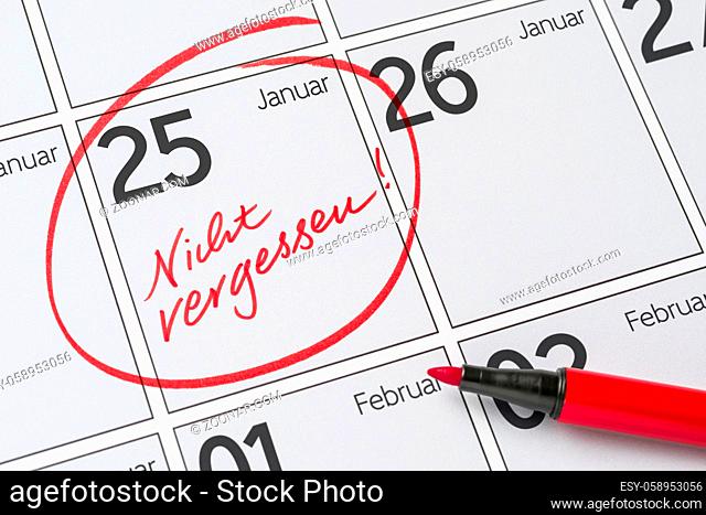 Save the Date written on a calendar - January 25 - Nicht vergessen in german