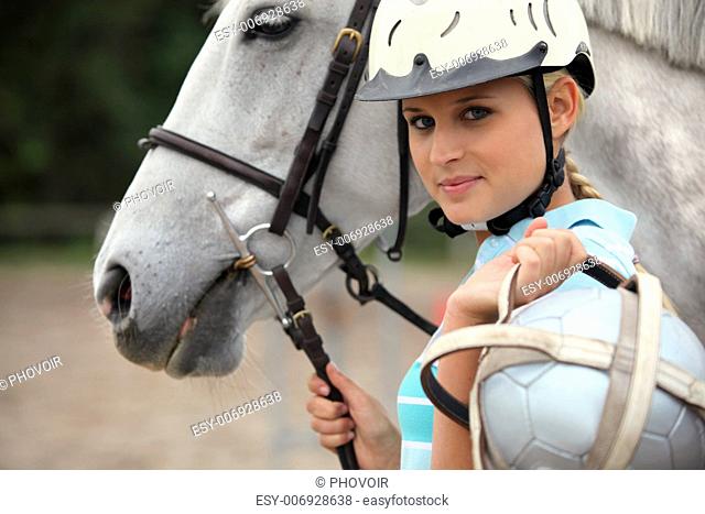female jokey and her horse