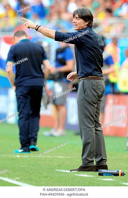 German head coach Joachim Loew gestures during to the FIFA World Cup 2014 group G preliminary round match between Germany and Portugal at the Arena Fonte Nova...