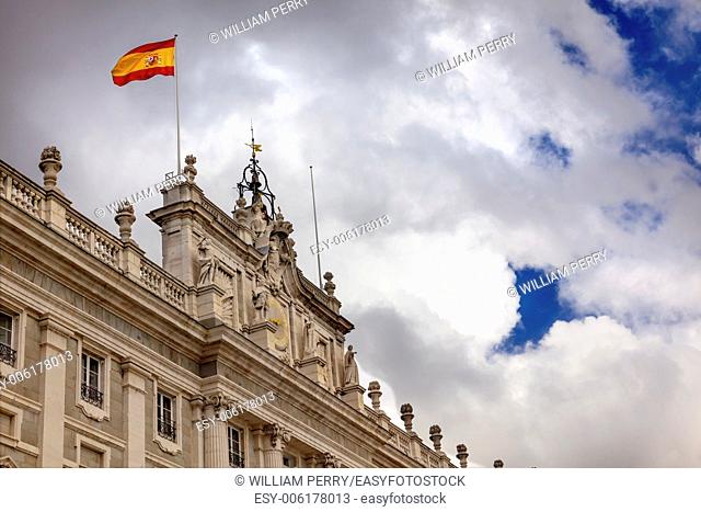 Royal Palace Palacio Real Clouds Sky Cityscape Spanish Flag Madrid Spain. Phillip 5 rreconstructed palace in the 1700s