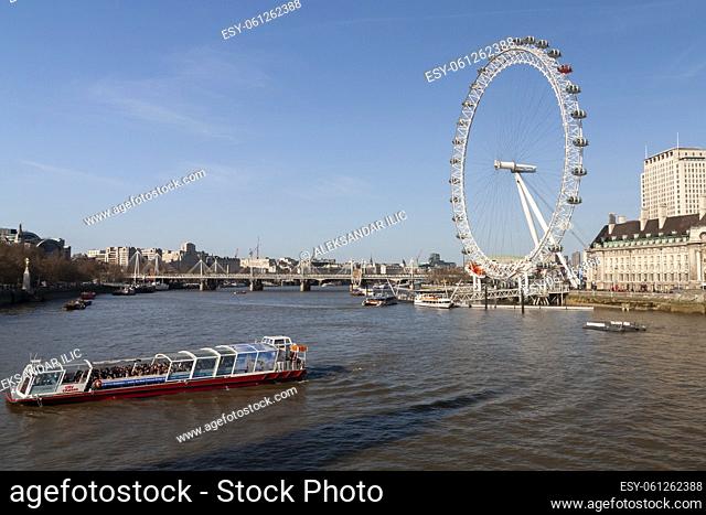 London, England - Aril 1, 2012: The London Eye, or the Millennium Wheel, is a cantilevered observation wheel (ferris wheel) on the South Bank of the River...