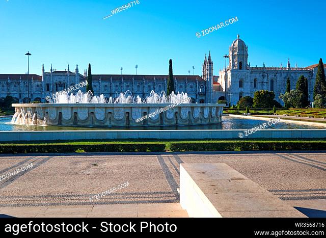 Empire Square with the fountain in the center and Jeronimos Monastery on the background. Lisbon, Portugal