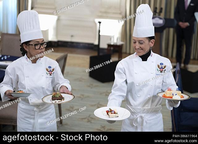 White House Executive Chef Cris Comerford display samples of food to be served during Thursday evening’s State Dinner in honor of French President Macron during...