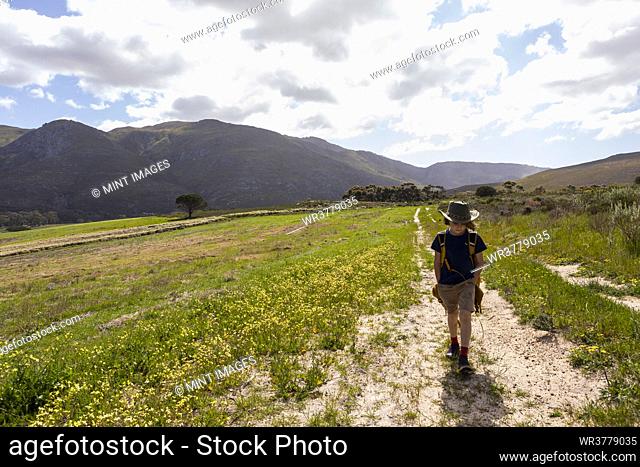 Young boy walking, Stanford Valley Guest Farm, Stanford, Western Cape, South Africa