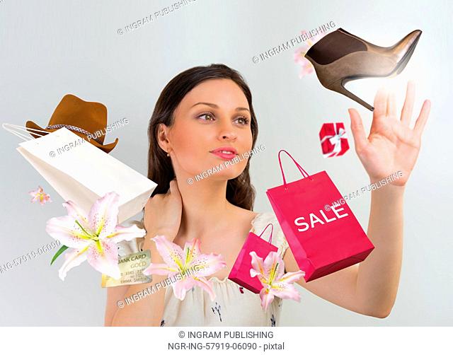 Woman shopping online using her virtual interface