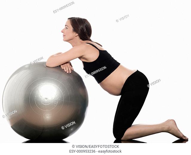 pregnant caucasian woman ball exercise isolated studio on white background