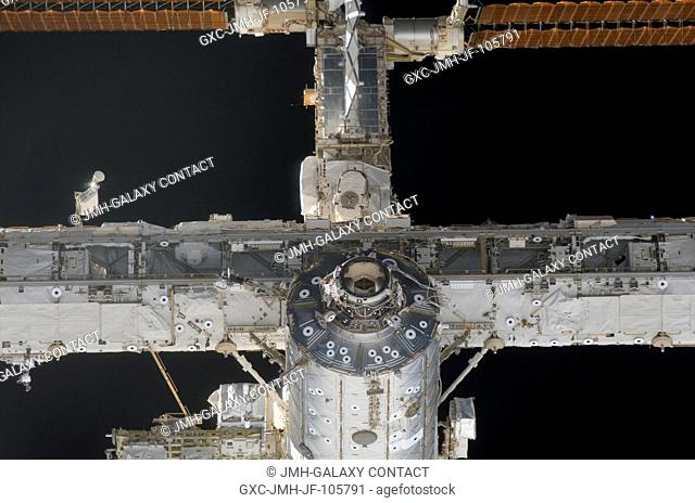 An astronaut onboard the Space Shuttle Atlantis took this photo of the International Space Station as the two spacecraft neared their link-up in space
