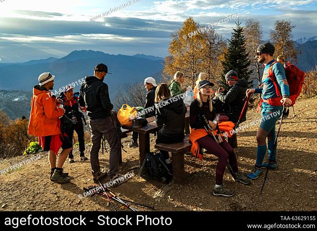 RUSSIA, SOCHI - OCTOBER 21, 2023: Nordic walkers take a break on Route No.8a in the Caucasus Nature Reserve in the resort of Sochi in autumn