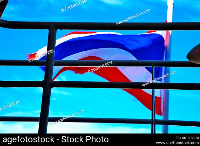 asia kho samui bay isle waving flag  in thailand and grate blue sky