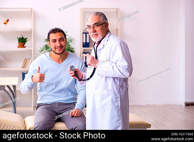 Sick man visiting old doctor
