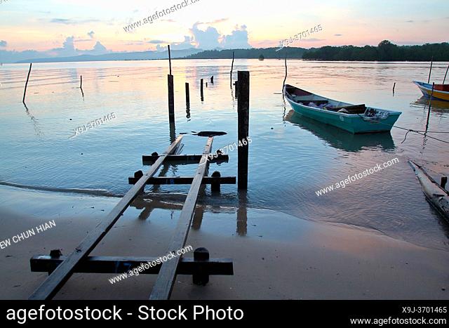 Sunrise at Buntal Fishing Village and Small fishing boats, kuching, Sarawak, malaysia