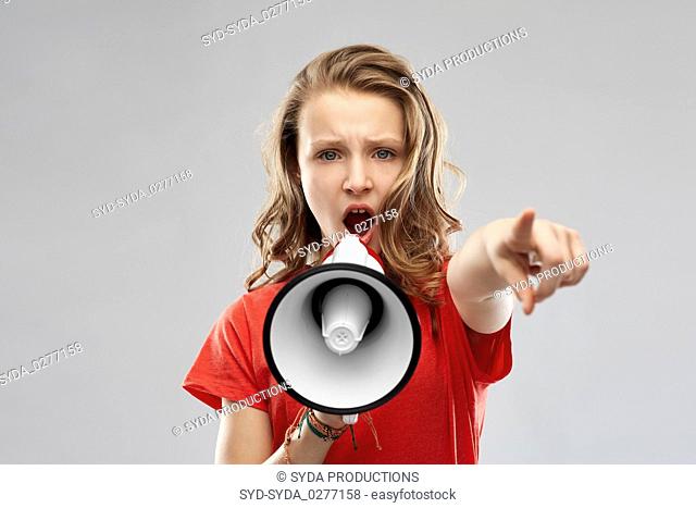 angry teenage girl speaking to megaphone