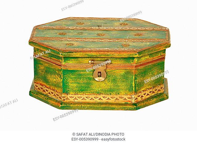 Brass design fitting on greenishyellow wooden box ; Jodhpur ; Rajasthan ; India