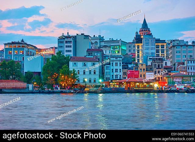 Istanbul, Turkey - July 18, 2018: Beyoglu district and Karakoy quayside in Istanbul in the evening