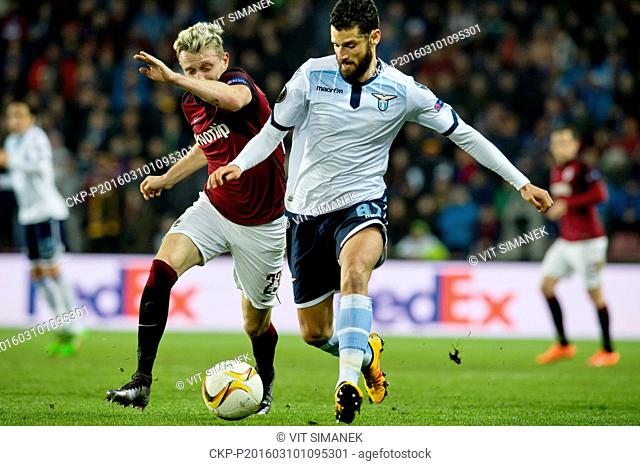 Ladislav Krejci of Sparta, left, and Antonio Candreva of Lazio fight for a ball during the European Football League group of sixteen opening match AC Sparta...