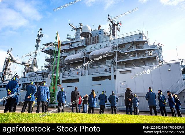 02 February 2022, Lower Saxony, Wilhelmshaven: Navy soldiers and a few members of the crew bid farewell to the naval ship ""Berlin""