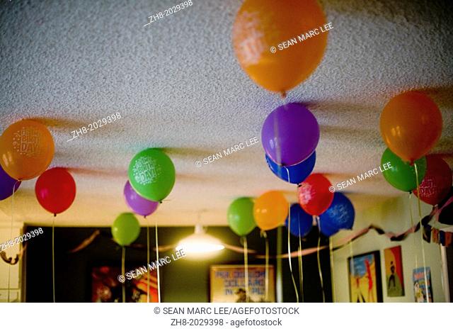 Colorful balloons at the top of the ceiling