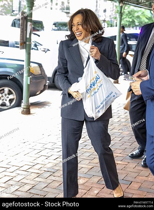 United States Vice President Kamala Harris smiles as she walks to her limo after purchasing cheese at Bowers Fancy Dairy Products Stand No