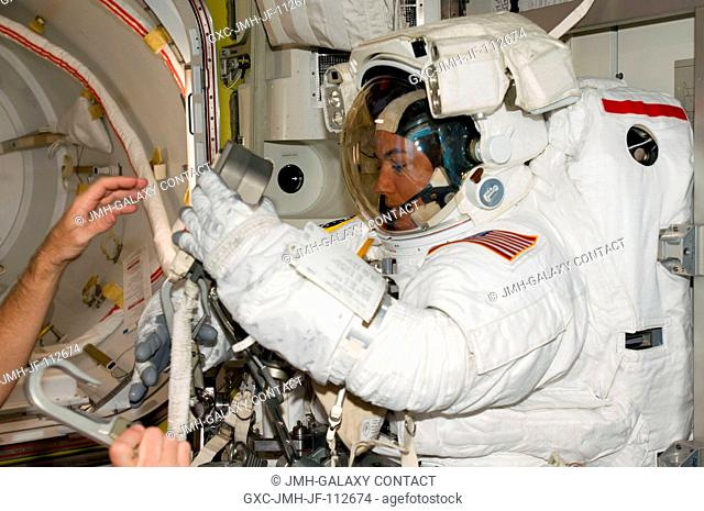 Astronaut Heidemarie Stefanyshyn-Piper, STS-126 mission specialist, attired in her Extravehicular Mobility Unit (EMU) spacesuit