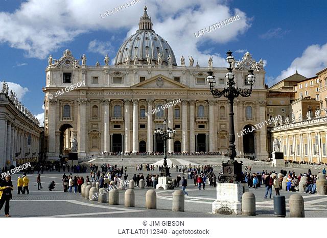 The Vatican city. St Peter's Basilica church. Dome. Facade. Crowd in St Peter's Square. People