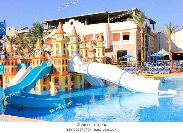 Water Slides at the Water Aquapark. Water Park for Kids at Sun Light