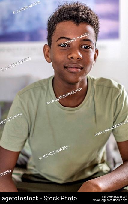 Teenage boy looking at camera