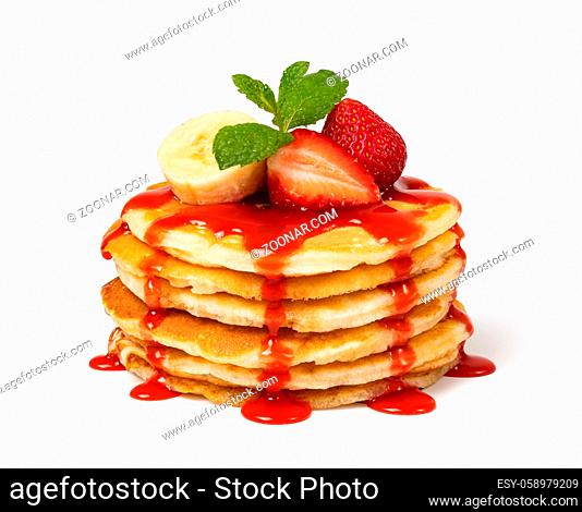 Pancakes with fresh strawberries and syrup Isolated on white background