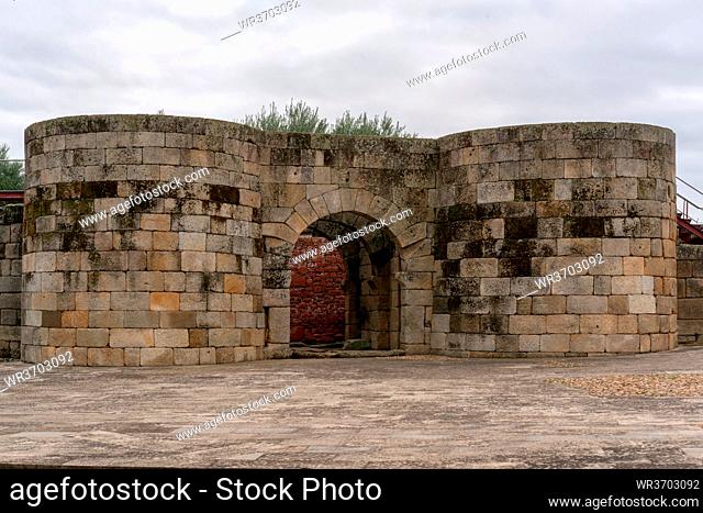Idanha a velha castle wall entrance gate on a cloudy day, in Portugal