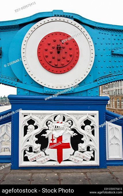 a particular of the steel structure of the tower bridge painted in 1977 wiht the red, white and blue colors in occasion of queen elizabet II's silver jubilee
