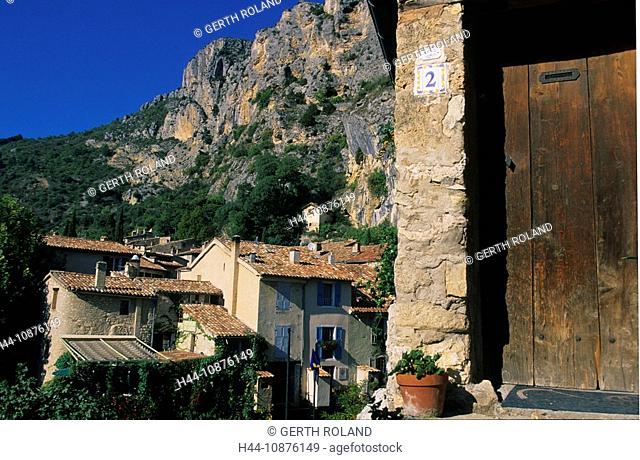 Moustiers-Sainte-Marie, France, Provence, Alpes-de-Haute-Provence, mountains, village, houses, homes, front door