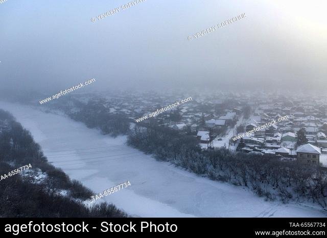 RUSSIA, OMSK - DECEMBER 8, 2023: An aerial view of the Siberian city of Omsk on a frosty winter day. According to Russia's weather forecasting agency