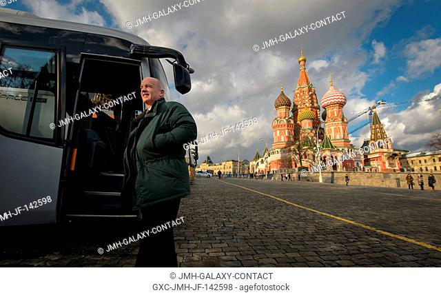 Expedition 47 NASA astronaut Jeff Williams exits his bus after arriving at Red Square to lay roses at the site where Russian space icons are interred as part of...