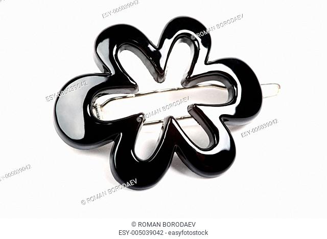 Black shiny woman hairpin isolated on white background