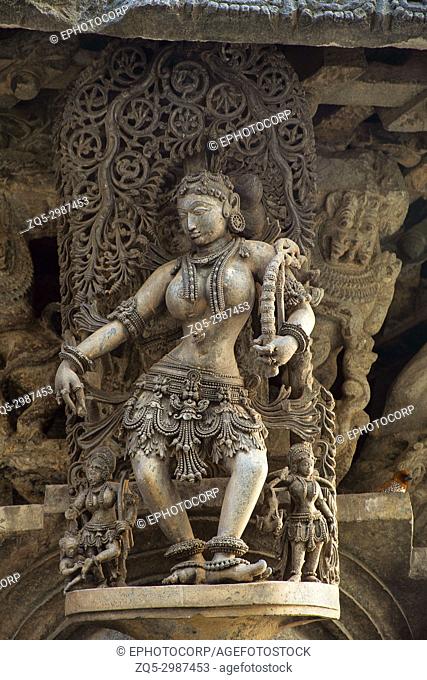 Lady with bow statue. Chennakeshava Temple, Belur, Hassan district Karnataka, India