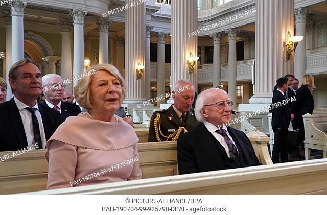 04 July 2019, Saxony, Leipzig: Sabina Higgins, wife of the Irish President (l) and Michael D. Higgins, President of Ireland sit in the Nikolaikirche