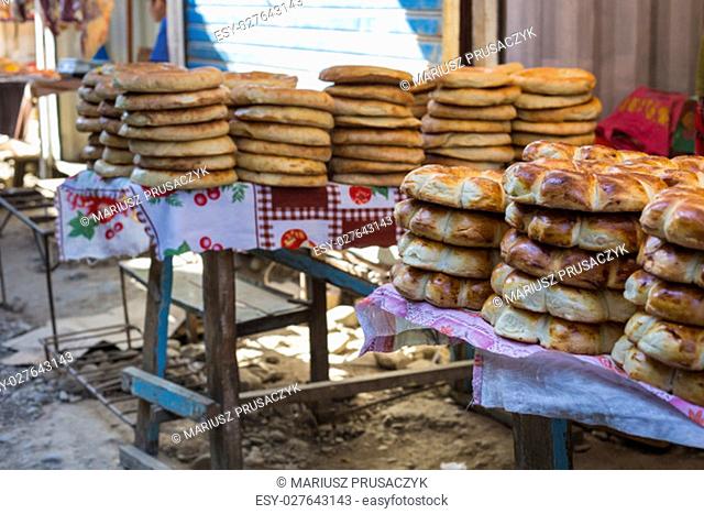 Kirghiz bread tokoch on Sunday market in Osh. Kyrgyzstan