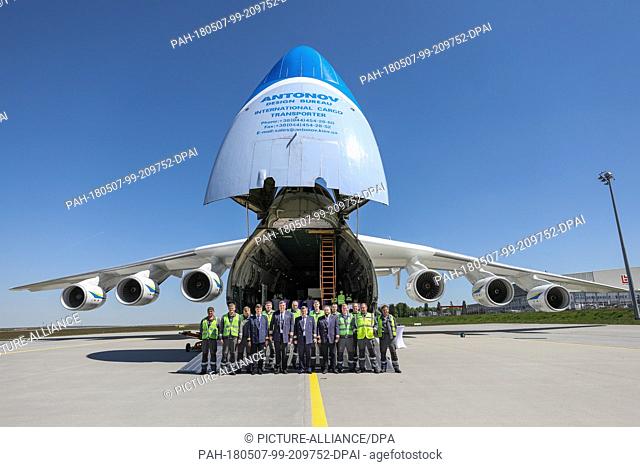 07 May 2018, Germany, Schkeuditz, Leipzig-Halle Airport: The crew of the Anotonov 225 standing before their aircraft for a group photo