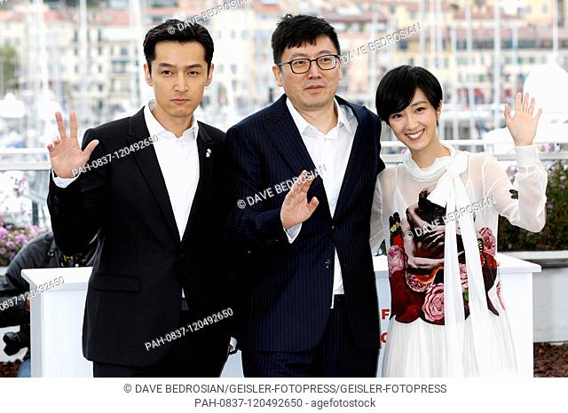 Ge Hu, Diao Yinan / Yi'nan Diao and Gwei Lun-Mei / Lun-Mei Kwei at the 'Nan Fang Che Zhan De Ju Hui / The Wild Goose Lake' photocall during the 72nd Cannes Film...