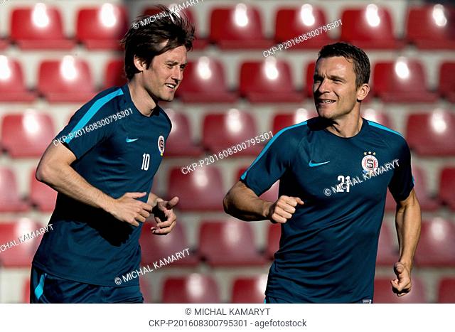Tomas Rosicky, left, and David Lafata attend a training session in Prague, Czech Republic, August 30, 2016. The captain of the Czech national football team