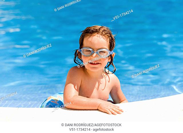Young girl in swimming pool