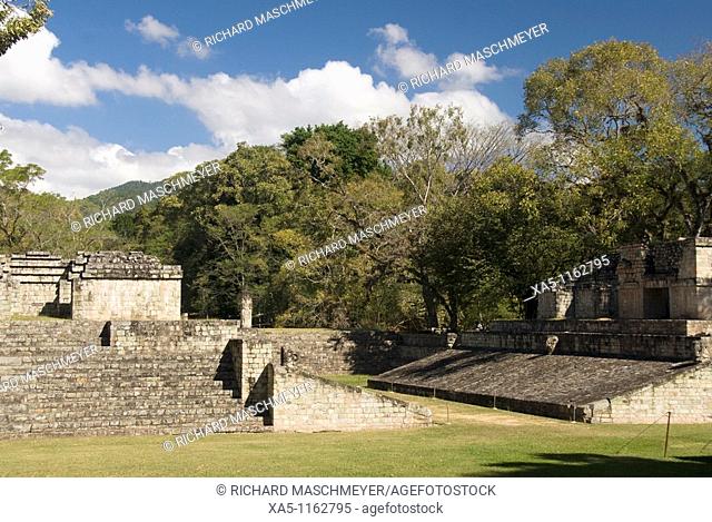 Structure 9 on the left and Ball Court on the right, Copan archaeological park, Copan Ruinas, Honduras