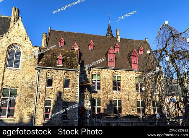 Old buildings by the canal in the historical city centre of Bruges, Belgium, Europe